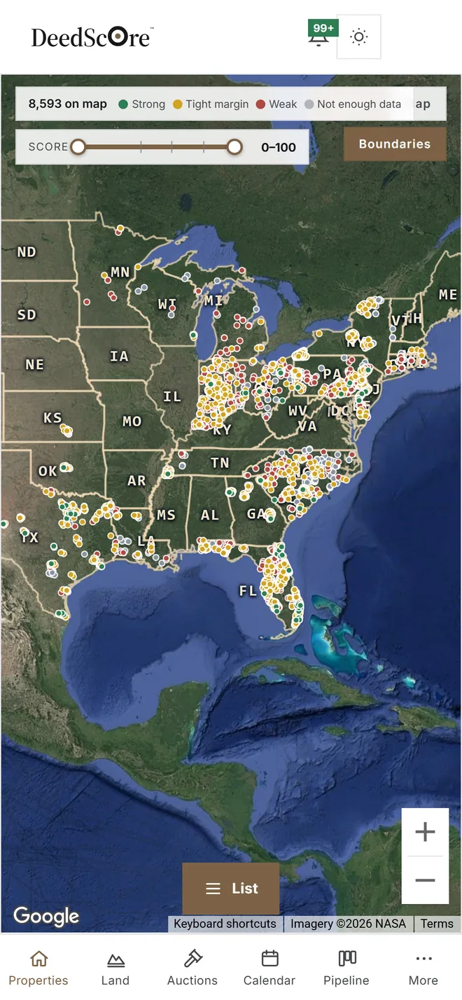 DeedScore on a phone: the Properties map of the eastern and central U.S. with score-colored pins in several states